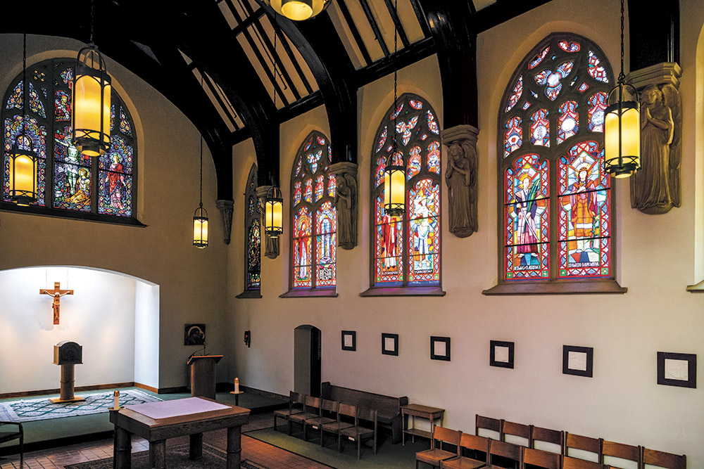 Corr Chapel interior showing stained glass windows