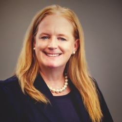 Headshot of Meredith Okenquist '96, Career Transitions Coach