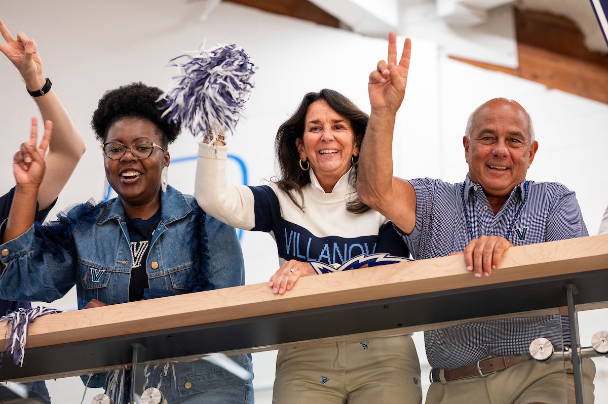 Connections Two women alumni and one man in the Pavilion