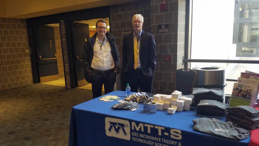Tommaso Cappello and Robert Caverly at an organization's table
