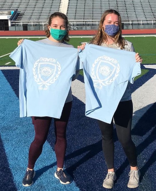 Two female students posing for washers champs photo