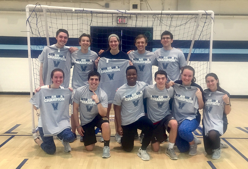 Students posing for handball photo