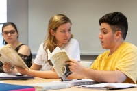 graduate students engaged in class discussion graduate students engaged in class discussion