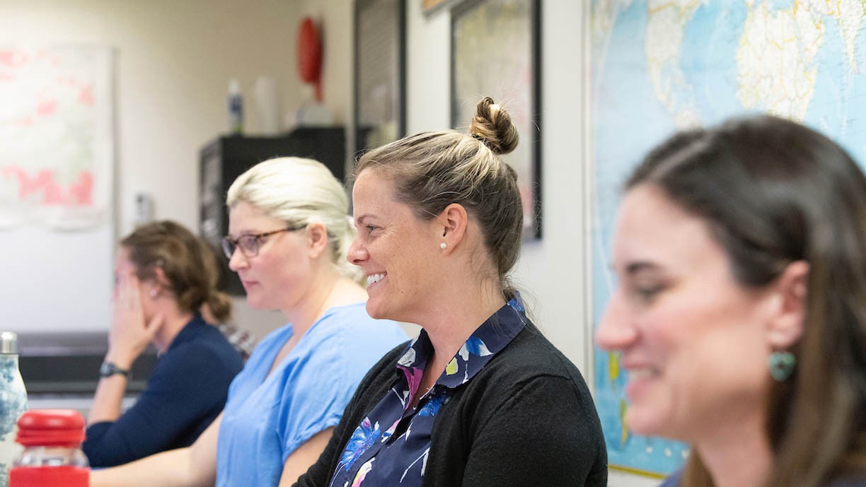 Four students in class. Four students in class.