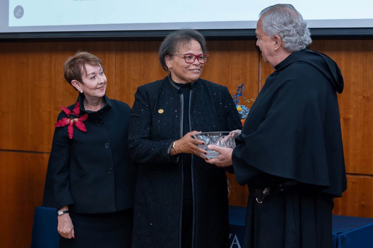 transformative-leadership-2.0 Dean Havens, Father Peter and the award recipient posing