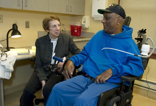 Dr. Suzanne C. Smeltzer Dr. Smeltzer with patient in wheelchair