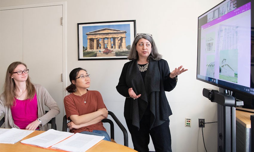 classics-professor-students-classroom Professors and students viewing image on screen