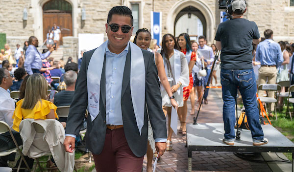 Male students processing at ceremony