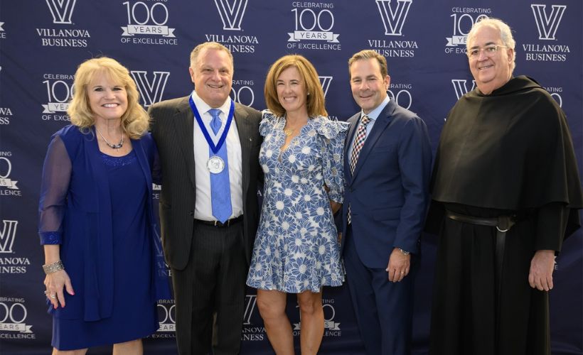 Joyce Russell, Justin and Victoria Gmelich, Pat Maggitti, and Fr. Peter