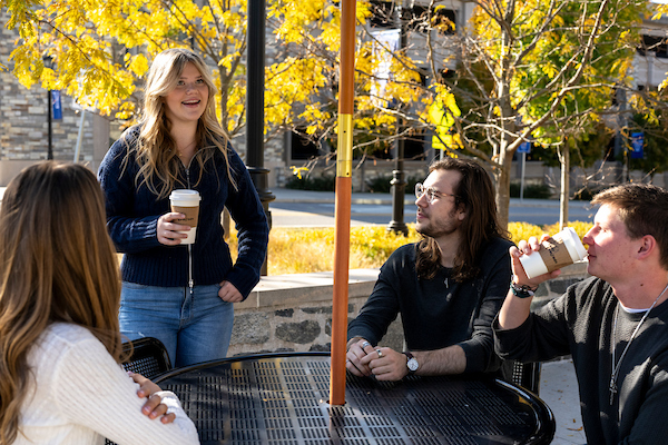 Ryan Stocker talking with classmates