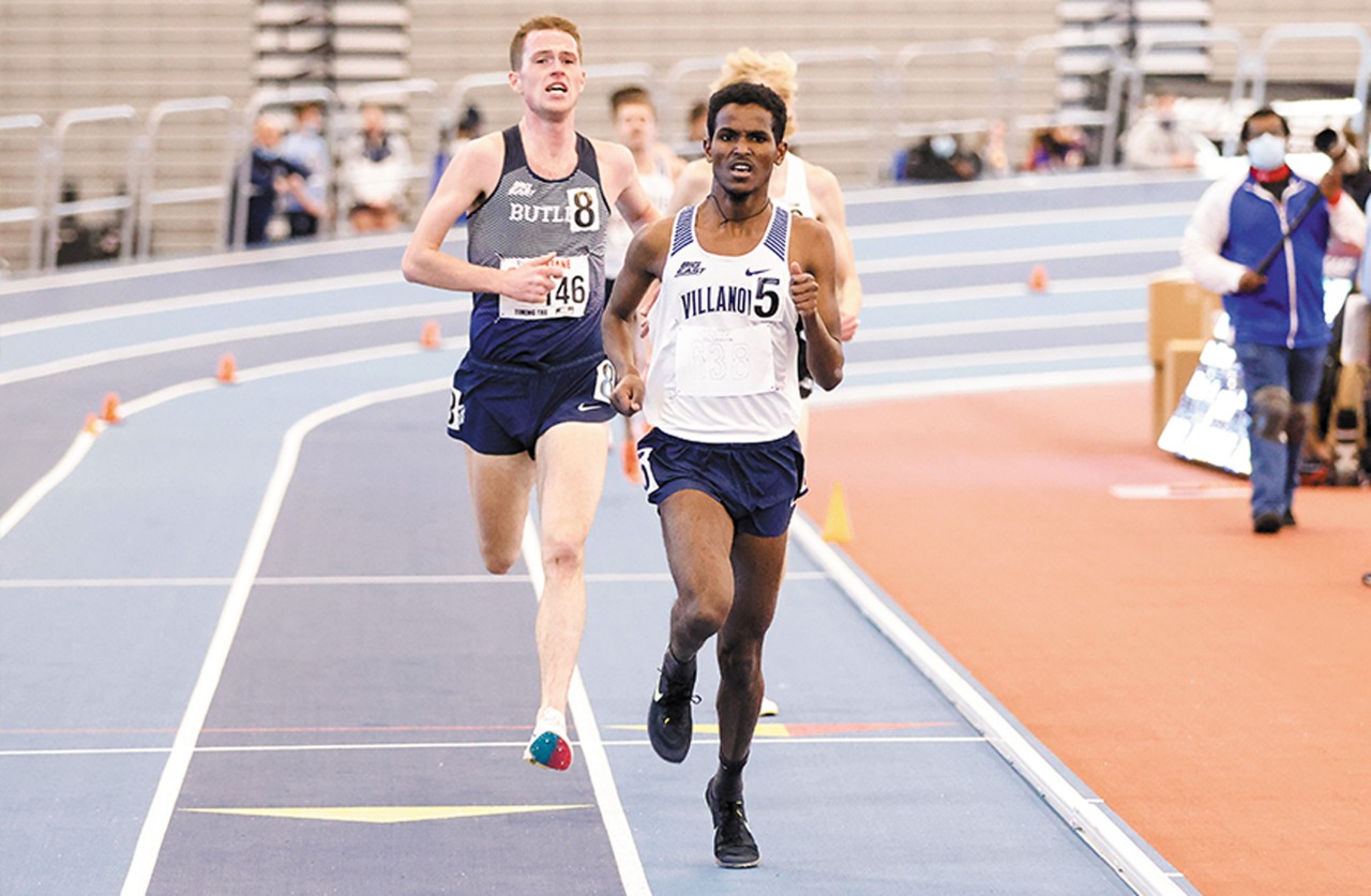 Villanova runner Haftu Strintzos running ahead of the pack in a track meet